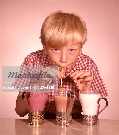 strawberry milkshakes with funny face straw toppers