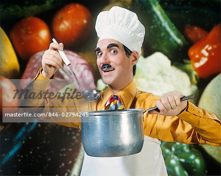 1970s FUNNY CHARACTER MAN IN CHEF HAT TOQUE HOLDING LADLE & SOUP POT VEGETABLE BACKDROP SILLY EXPRESSION COOKING SHOW