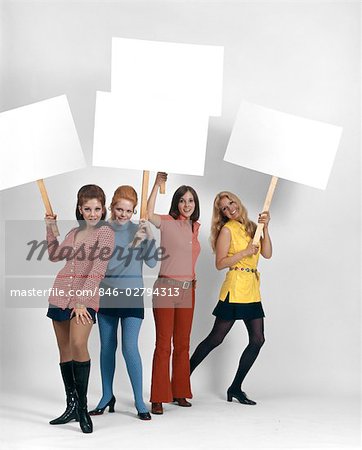 1960s FOUR WOMEN PROTESTERS HOLDING BLANK SIGNS