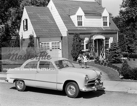 1940s 1950s SON & DAUGHTER RUNNING FROM HOUSE TOWARDS 1948 FORD AUTOMOBILE