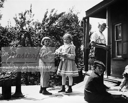 1890s 1900s TURN OF THE CENTURY GROUP OF CHILDREN STANDING ON