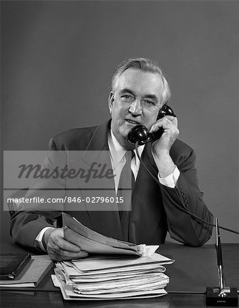 1950s MAN TELEPHONE CALL WORK BUSINESS PAPERWORK PEN