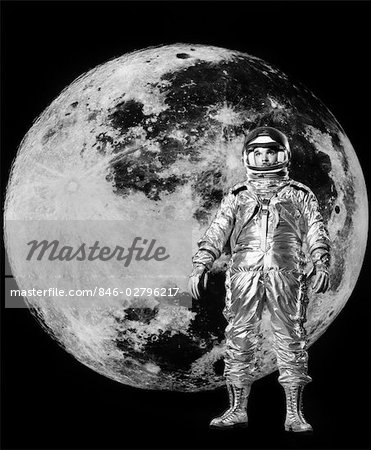 1960s MAN IN SILVER ASTRONAUT SUIT WITH MOON IN BACKGROUND
