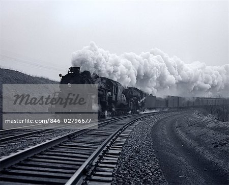 1940s 1950s SPEEDING STEAM LOCOMOTIVE PASSENGER TRAIN NEAR PORT JERVIS NEW YORK USA