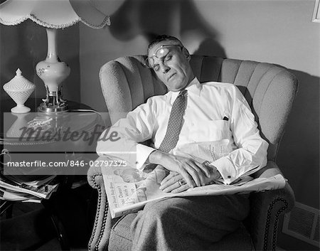 1940s Man Fell Asleep While Reading Newspaper In Chair Glasses On Forehead Stock Photo Masterfile Rights Managed Artist Classicstock Code 846