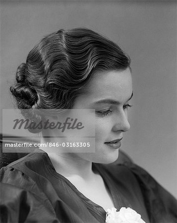 1930s 1940s THOUGHTFUL BRUNETTE WOMAN IN PROFILE WITH WAVY HAIR - Stock  Photo - Masterfile - Rights-Managed, Artist: ClassicStock, Code:  846-03163305