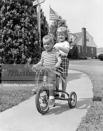 kids riding bikes black and white