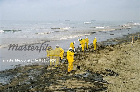 MOPPING UP OIL SPILL HUNTINGTON BEACH, CALIFORNIA