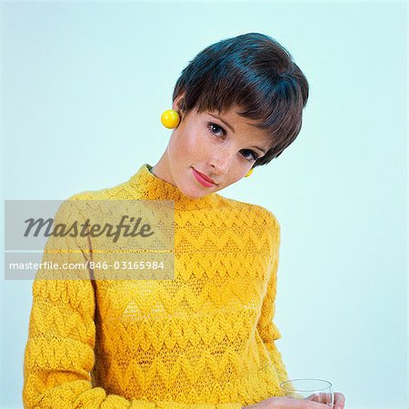 1960s Brunette Woman Short Pixie Hair Style Yellow Knit Sweater