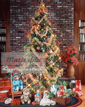 CHRISTMAS TREE WITH DECORATIONS GARLAND LIGHTS TOYS AND PRESENTS UNDER TREE