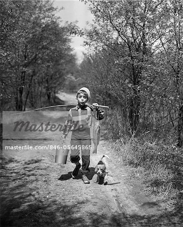 1950s BOY BEAGLE PUPPY WALKING DOWN COUNTRY ROAD WHISTLING CARRYING FISHING  POLE PAIL FISH - Stock Photo - Masterfile - Rights-Managed, Artist:  ClassicStock, Code: 846-05645865