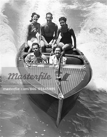 1930s COUPLES FIVE MEN AND WOMEN RIDING IN RUNABOUT POWER BOAT