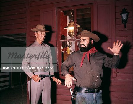 1960s - 1970s WESTERN SHERIFF ARRESTS BEARDED COWBOY ABOUT TO DRAW GUN