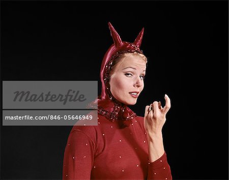 1960s WOMAN RED DEVIL COSTUME WITH HORNS BECKONING WITH INDEX FINGER COME HITHER GESTURE