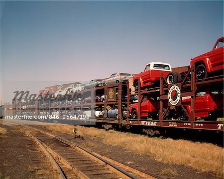 1960 1960s NEW CARS & TRUCKS TRANSPORTED ON NORTHERN PACIFIC RAILROAD RAILWAY TRAIN TRANSPORTATION