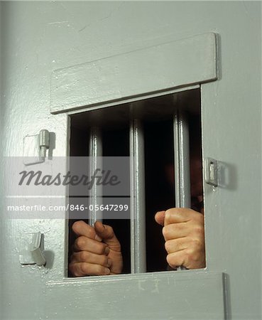 1980s HANDS ON JAIL CELL BARS