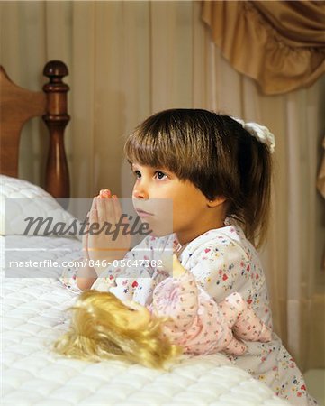 Girl Praying at Her Bedside