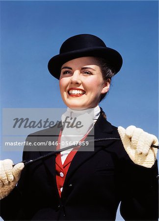 1940s - 1950s PORTRAIT SMILING WOMAN WEARING EQUESTRIAN RIDING OUTFIT