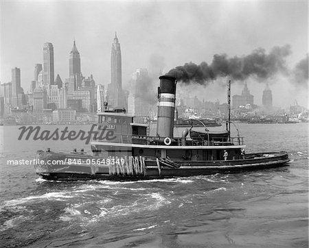 1940s TUGBOAT ON HUDSON RIVER WITH NEW YORK CITY SKYLINE IN SMOKEY BACKGROUND OUTDOOR