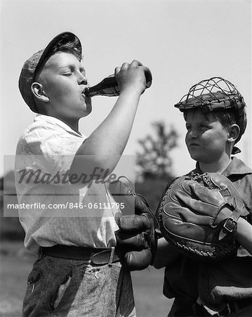 Baseball Wearing Baseball Hat With A Number One Glove Stock Photo