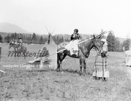 1920s NATIVE AMERICAN SIOUX FAMILY WOMAN MOTHER CHILDREN BY TEPEE GIRL DAUGHTER ON HORSEBACK