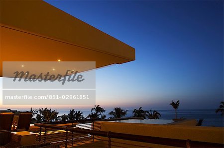 Sunrise over beach umbrellas in Los Cabos,Baja California,Mexico