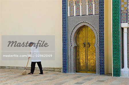Street sweeper outside Royal Palace,Fez,Morocco