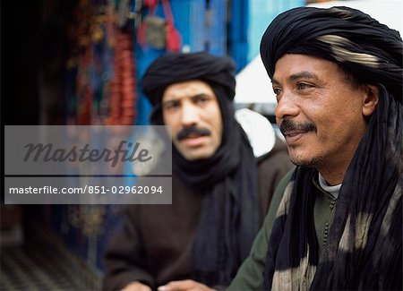 Shopkeepers talking in backstreets,Essaouira,Morroco. Shopkeepers talking in backstreets,Essaouira,Morroco.