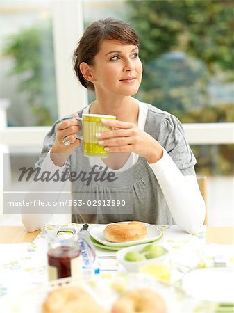 Woman having breakfast