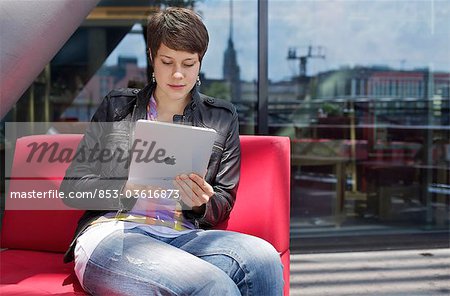 Young woman using iPad