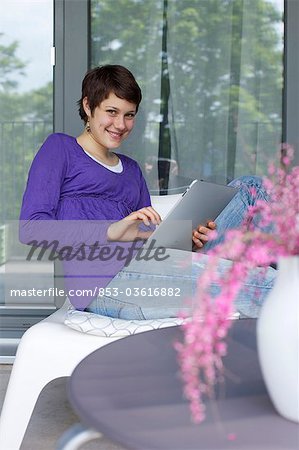 Young woman using iPad