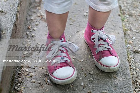 Girl with children's shoes, lower section