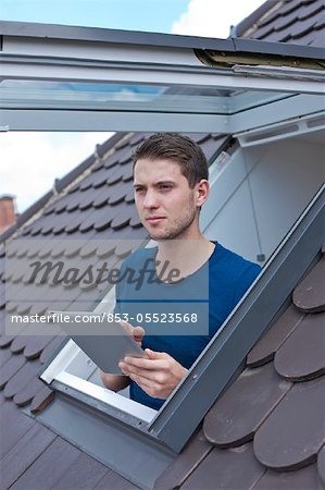 Young man with ipad