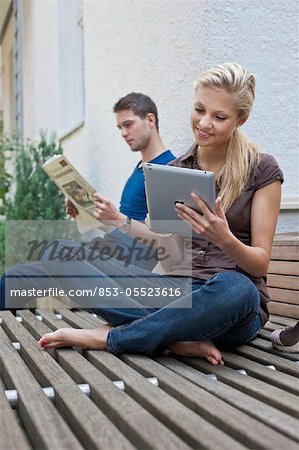 Young couple with ipad
