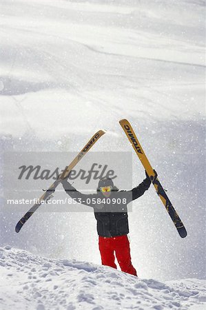 Skier standing at mountain