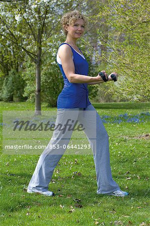 Woman with dumbells