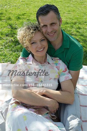 Mature couple having a picnic