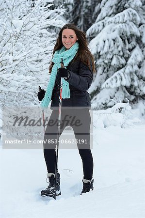Young woman in snow, Upper Palatinate, Germany, Europe