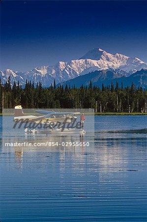 Man on Floatplane AK Range Lake Spin Fishing Summer AK Mt McKinley Southside Southcentral