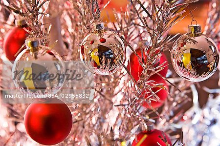 Closeup View Of Many Gold Silver Decorations On Christmas Tree