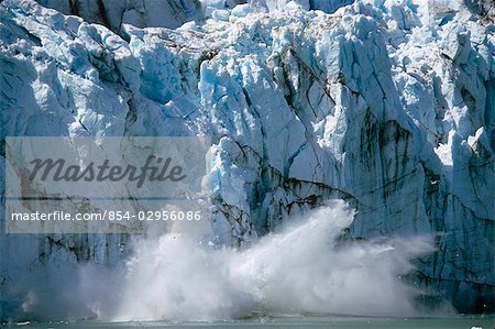 Ice calving off of Margerie Glacier into Tarr Inlet Glacier Bay National Park Southeast Alaska Summer