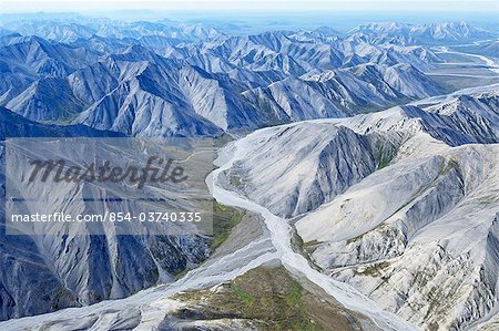 Aerial of the rugged Philip Smith Mountains portion of the Brooks Range in ANWR, Arctic Alaska, Summer, HDR