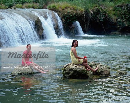 Girls at the waterfall