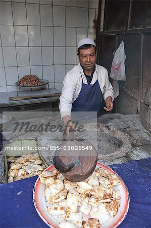 Samosa (Uyghur dimsum) bakery,Bazaar of Kuche (Kuqa),Xinjiang,China