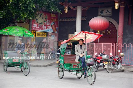Tricycles at the front of Kaiyuan temple, old town of Chaozhou, China