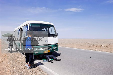 A bus break down at Gobi desert, Dunhuang, Gansu Province, Silkroad, China