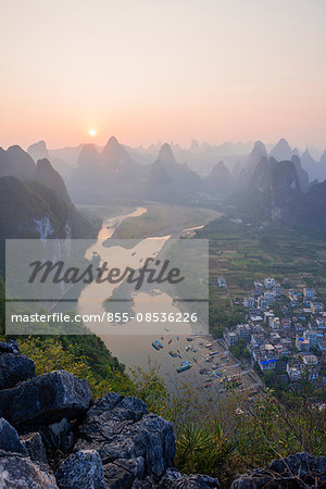 Sunset over Karst peaks with Li river (Lijiang) view from hilltop of Mt. Laozhai (Laozhaishan/Old fortress hill), Xingping, Yangshuo, Guilin, Guanxi, PRC