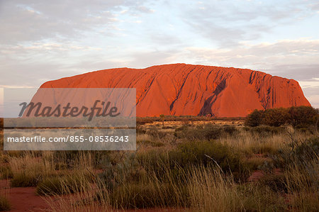 Uluru/Ayers Rock at dusk, 348M high rising 861M above sea level, Northern Territory, Central Australia