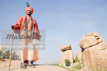 Low angle view of a sadhu, Hampi, Karnataka, India