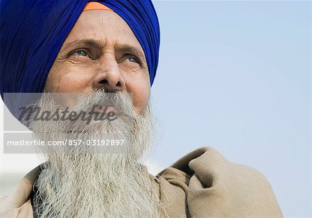 Close-up of a Sikh man thinking, Amritsar, Punjab, India